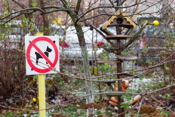 prohibition sign no dogs in the park. playground area security