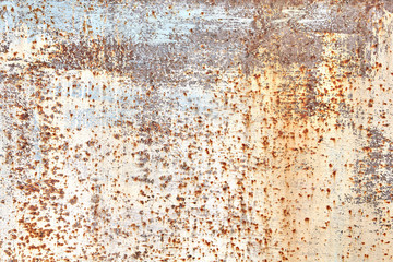 Faded paint rusty sheet of metal abstract texture.