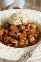 Classic beef cobbler a meat stew with vegetables and a suet dumpling