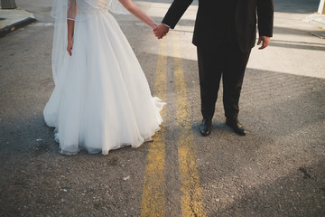 Fototapeta na wymiar bride and groom in white wedding dress