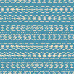 Seamless Christmas pattern with snowflakes and ornamentl lines on blue background.