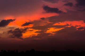 Evening sky with sunset light and colorful clouds as a background