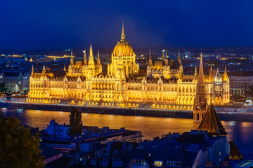Fototapeta premium Budapest, Hungary - October 01, 2019: Budapest Parliament at night. View of Hungarian Parliament Building, Royal Palace and Danube river.
