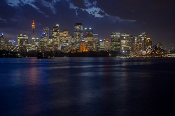 Obraz na płótnie Canvas Sydney City Skyline at night across harbour