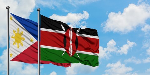 Philippines and Kenya flag waving in the wind against white cloudy blue sky together. Diplomacy concept, international relations.