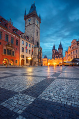 Prague, Czech Republic. Cityscape image of famous Old Town Square with the Prague Astronomical Clock and Old Town Hall during twilight blue hour.  - obrazy, fototapety, plakaty