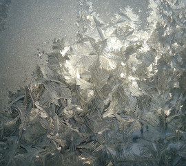 Winter beauty on glass, frost on frozen window