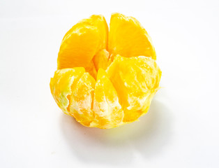 peeled orange isolated on a white background