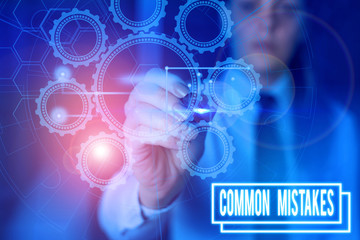 Writing note showing Common Mistakes. Business concept for actions that are often used interchangeably with error Picture photo network scheme with modern smart device