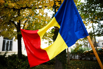 Details with the Romanian flag with a hole, the symbol of the Romanian Revolution from December 1989 when the communist emblem was cut out from the flag.