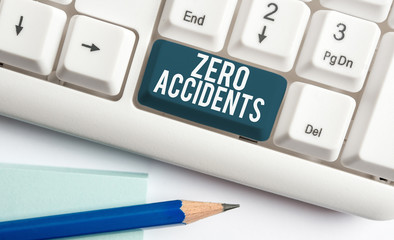 Text sign showing Zero Accidents. Business photo showcasing important strategy for preventing workplace accidents White pc keyboard with empty note paper above white background key copy space