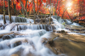 Amazing in nature, beautiful waterfall at colorful autumn forest in fall season