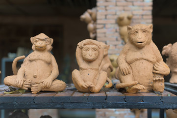 Lopburi, Thailand - November 2, 2019: Community Ban Din Mot Daeng Market.Monkey clay dolls.