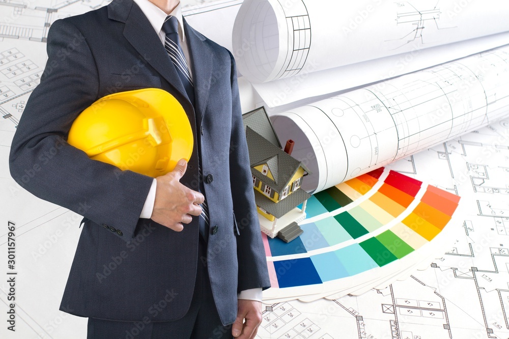 Wall mural Worker with a tool belt. Isolated over white background.