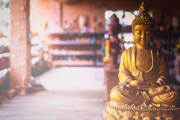 Lopburi, Thailand - November 2, 2019: Community Ban Din Mot Daeng Market.Close-up  Buddha statue...