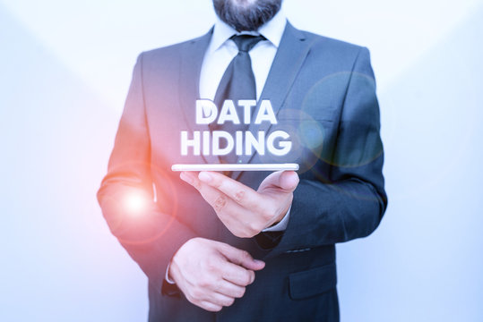 Word writing text Data Hiding. Business photo showcasing Secretly embedding data in graphics images and other file types Male human wear formal work suit hold smart hi tech smartphone use one hand