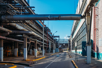 Fototapeta premium Chemical factory. Steel pipeline system for delivering components