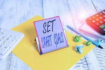 Word writing text Set Smart Goals. Business photo showcasing giving criteria to guide in the...
