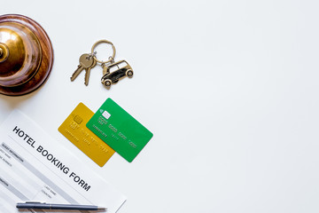 hotel reservation blank and ring on white background top view mockup