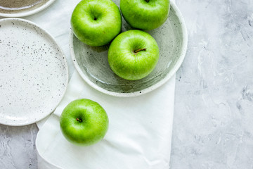 ripe green apples stone table background top view space for text