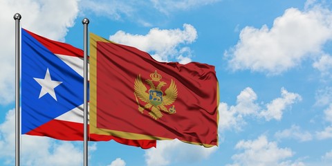 Puerto Rico and Montenegro flag waving in the wind against white cloudy blue sky together. Diplomacy concept, international relations.