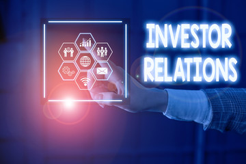 Writing note showing Investor Relations. Business concept for analysisagement responsibility that integrates finance Picture photo network scheme with modern smart device