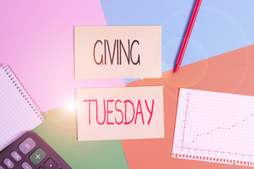Text sign showing Giving Tuesday. Business photo showcasing international day of charitable giving Hashtag activism Office appliance colorful square desk study supplies empty paper sticker