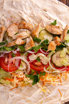 Ingrdients for opular arabic turkish fastfood doner shawarma roll with meat and vegetables. Top view