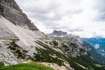 Fototapeta na wymiar Dolomites, Italy - July, 2019: Amazing panoramic view from Tre Cime over the Dolomite's mountain