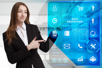 Business, Technology, Internet and network concept. Young businessman working on a virtual screen of the future and sees the inscription: Data protection