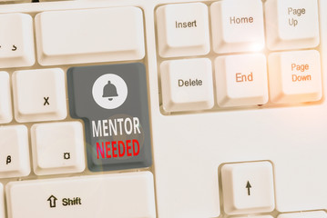 Writing note showing Mentor Needed. Business concept for wanted help for more experienced or more...