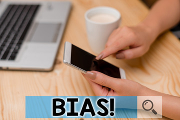 Conceptual hand writing showing Bias. Concept meaning inclination or prejudice for or against one...
