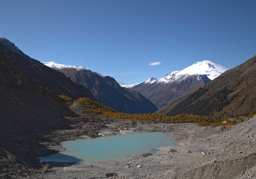 Autumn view of Elbrus and Bashkara lake