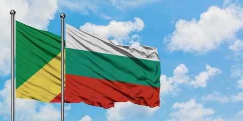 Republic Of The Congo and Bulgaria flag waving in the wind against white cloudy blue sky together. Diplomacy concept, international relations.