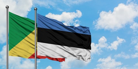 Republic Of The Congo and Estonia flag waving in the wind against white cloudy blue sky together. Diplomacy concept, international relations.