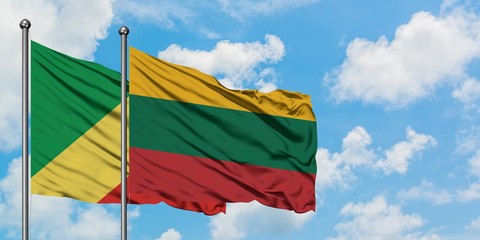 Republic Of The Congo and Lithuania flag waving in the wind against white cloudy blue sky together. Diplomacy concept, international relations.