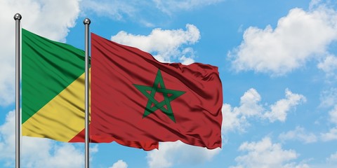 Republic Of The Congo and Morocco flag waving in the wind against white cloudy blue sky together. Diplomacy concept, international relations.