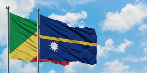 Republic Of The Congo and Nauru flag waving in the wind against white cloudy blue sky together. Diplomacy concept, international relations.