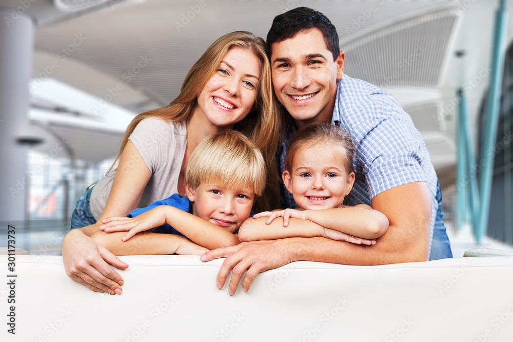 Canvas Prints young family at home smiling at camera