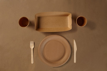 Eco friendly disposable tableware. Biodegradable craft dishes. Recycling concept. Also used in fast food, restaurants, takeaways, picnics. Close-up.