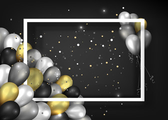 Golden black and silver balloons with white frame on shiny striated  surface,