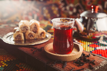 delicious turkish tea and baklava on colorful rug