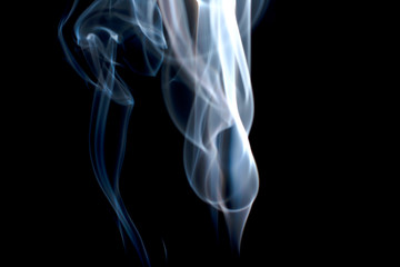 Colorful smoke on dark background.