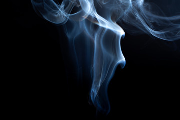 Colorful smoke on dark background.