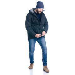 Fototapeta premium Man in winter jacket standing cold