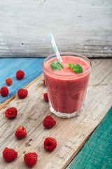 fruit healthy smoothie on wooden table