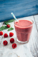 fruit healthy smoothie on wooden table