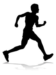 Silhouette runner in a race track and field event