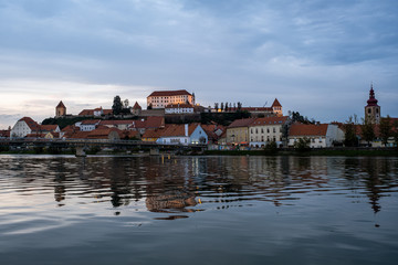 Fototapeta na wymiar Ptuj refelction a city in the eastern part of slovenia during sunset