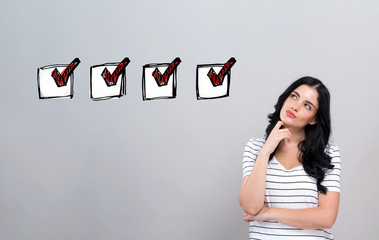 Checklist with young woman in a thoughtful face